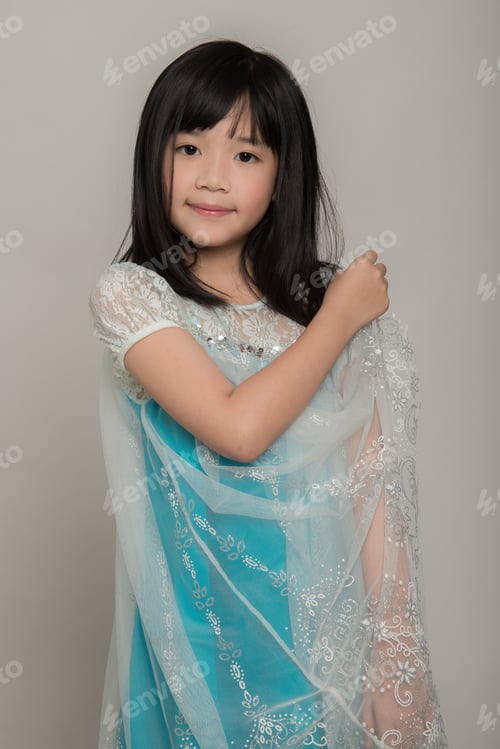 Preview: Portrait Of Beautiful Asian Girl Wearing Blue Dress