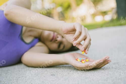 Preview: Crazy In Slim Young Women In Sportswear Falling On Sidewalk Trying To Eat Many Pills In