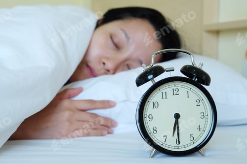 Preview: Sleeping Woman And Alarm Clock