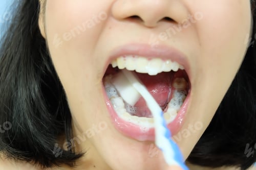 Preview: Woman Brushing Teeth With Toothbrush