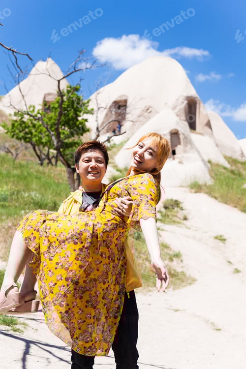 Preview: Vacation In Turkey View Of Uchisar Castle Village During Summer With Tourist Model