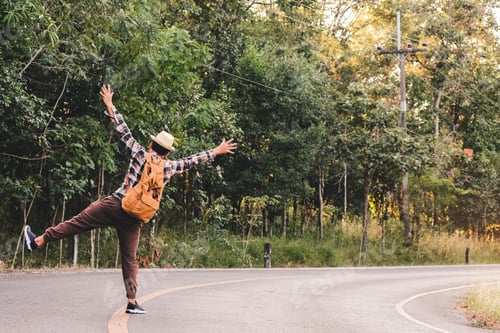 Preview: Young Boy Traveler With Backpack Enjoying And Walking On The Road In Tropical Forest, Thailand
