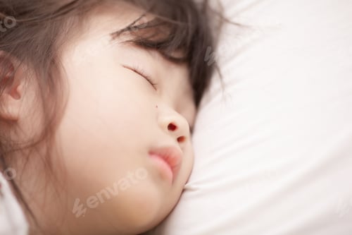 Preview: Asian Little Girl Sleeping On The Bed
