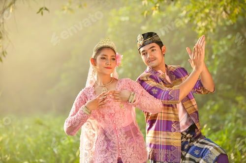 Preview: Asian Man And Woman Wearing Traditional Dress Muslim In Dancing Action,Thailand