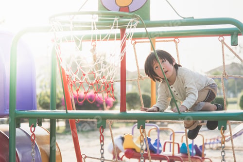 Preview: Asian Child Playing On Playground In Summer Outdoor Park,Vintage Filter