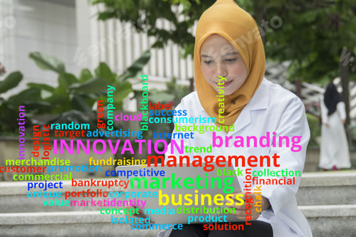 Preview: Concept Or Conceptual Business Abstract Words Cloud On Young Female Doctor Background.