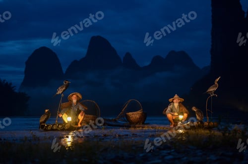 Preview: Fisherman Of Guilin, Li River And Karst Mountains During The Blue Hour Of Dawn,Guangxi China