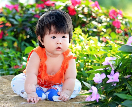 Preview: Asian Little Child In The Garden