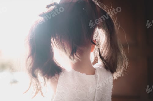 Preview: Girl with Pigtails Looking at a Window