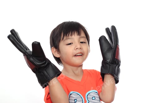 Preview: Happy Asian Boy With Gloves Isolated On White Background