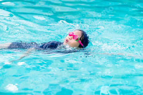Preview: Girl Swimming In The Pool