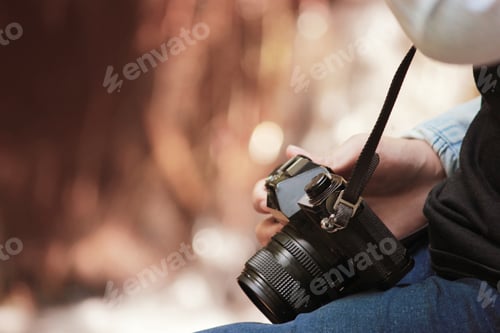 Preview: Beautiful Woman And Camera With Backpack In The Jungle On The Mountain. Concept Travel, Color Of