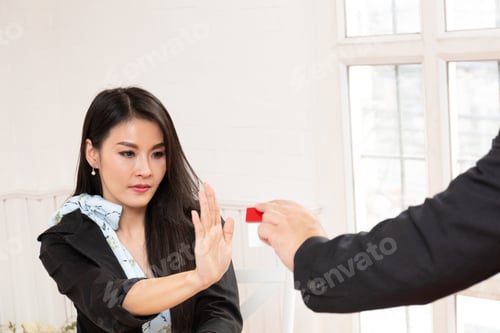 Preview: Man Giving Bribe To Businesswoman At Workplace In Office