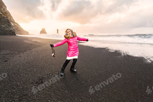 Preview: Reynisfjara Or Better Known As Black Sand Beach View During Sunrise With Female Model