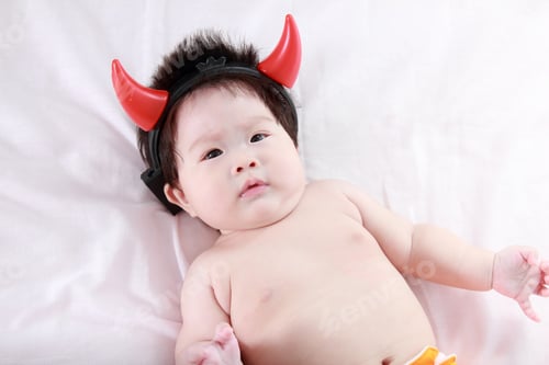 Preview: Adorable Newborn Baby With Devil Horn
