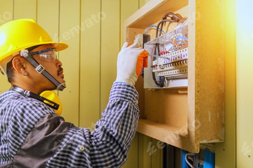 Preview: Close-Up Of Electrician Work.Electrician Engineer Tests Electrical Installations And Wires On Relay
