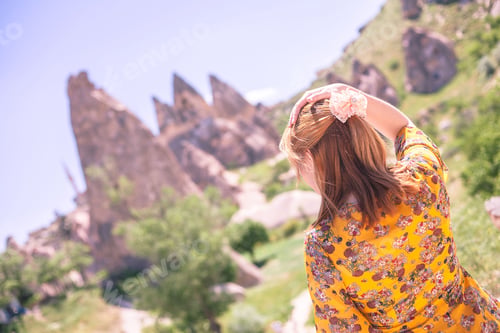 Preview: Vacation In Turkey View Of Uchisar Castle Village During Summer With Tourist Model
