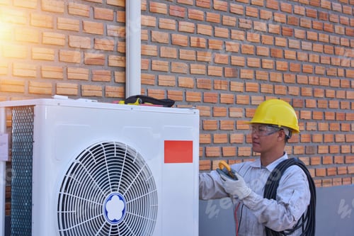 Preview: A Young Asian Air Conditioner Technician Or Air-Conditioning Installation Technician Is About To