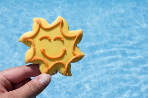 Preview: A Smiley Face On A Starfish Shaped Cookie.