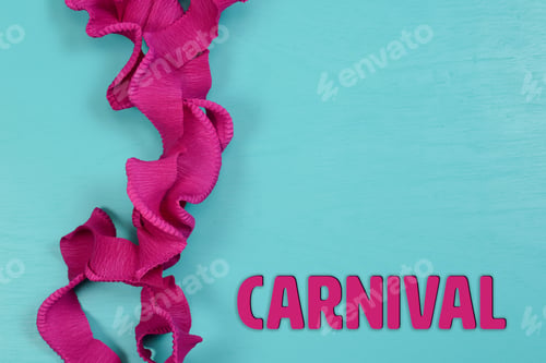 Preview: Carnival Lilas Ribbon On Blue Background With Space For Text And Already Written Carnival In English