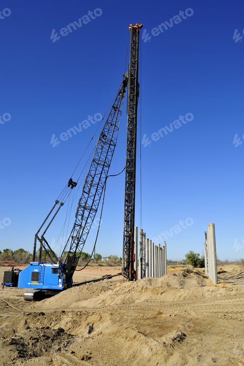 Preview: Pile Driver Works To Set Precast Concrete Piles For New Bridge