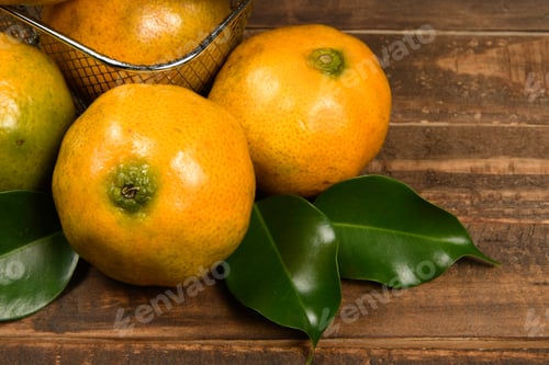 Preview: Fresh Mandarin Oranges Fruit Or Tangerines Basket On Wooden Table