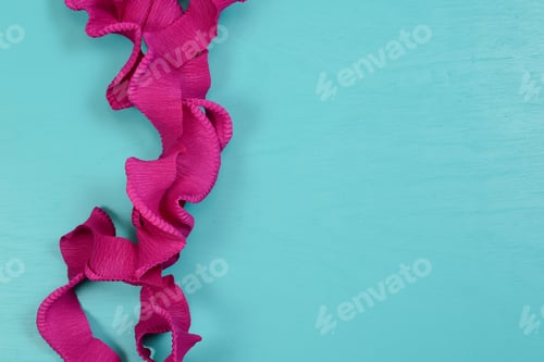 Preview: Carnival Lilas Ribbon On Blue Background With Space For Text