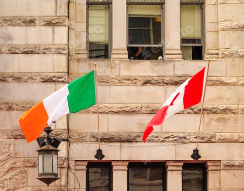 Preview: Irish And Canadian Flags On An Old Stone Building In Victoria, British Columbia