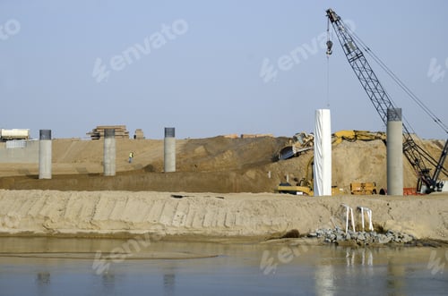 Preview: Bridge Construction Project: Concrete Columns Are Poured In Place. Reinforcing Bars At The Top Will