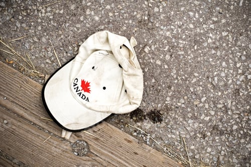 Preview: A Hat With Canada And A Red Maple Leaf On It.