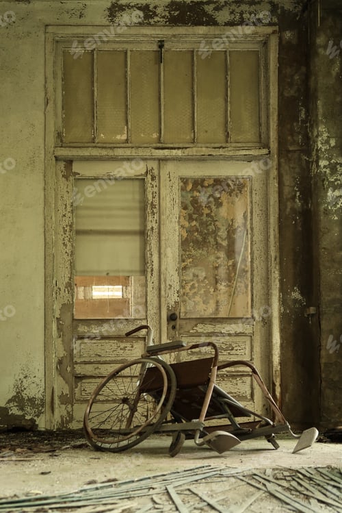 Preview: Wheel Chair In An Abandoned Building. Natural Light.
