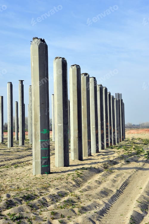 Preview: Multiple Pilings Sunk In River Bed Will Support New Bridge Under Construction