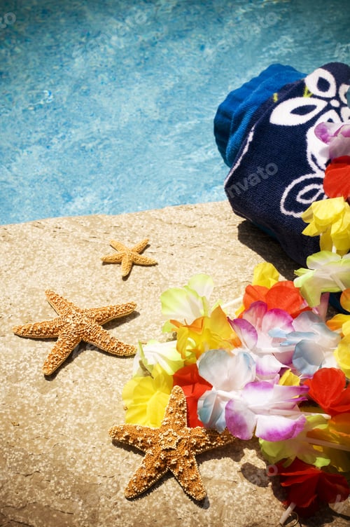 Preview: Three Starfishes Next To A Towel And Flower Chain.