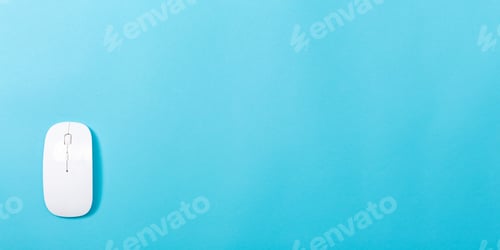 Preview: Computer Mouse On A Blue Paper Background