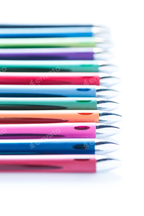 Preview: Line Of Many Colored Pens On A White Background