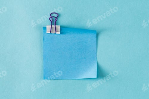 Preview: Blank Sticky Note On A Blue Background