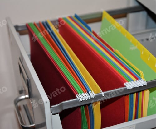 Preview: Colorful File Folders In A Metal File Cabinet.
