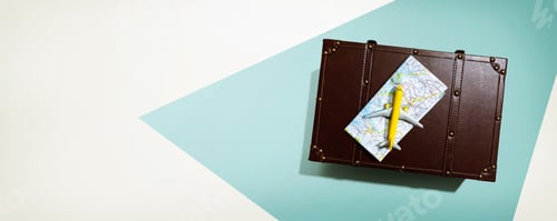 Preview: Travel Theme With A Miniature Airplane And A Suitcase - Flat Lay