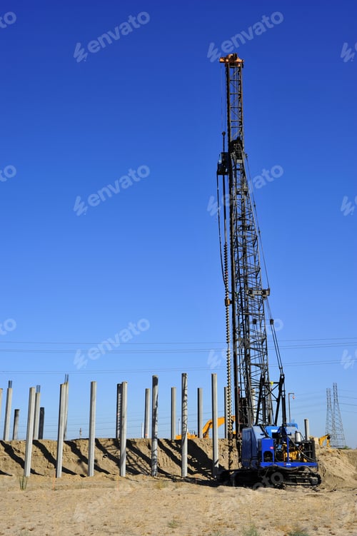 Preview: Pile Driver Works To Set Precast Concrete Piles For New Bridge