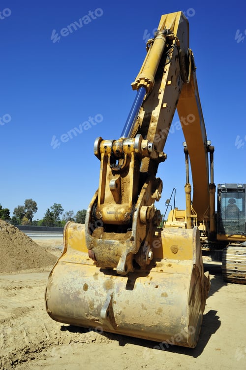 Preview: Large Bucket Is Operated By Crane'S Articulated Boom On Construction Job Site