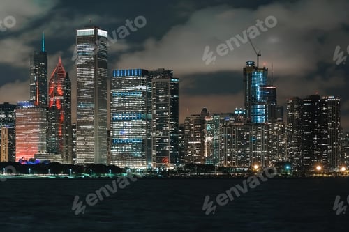 Preview: Downtown Chicago Cityscape Skyline At Night With Lake Michigan In The Foreground