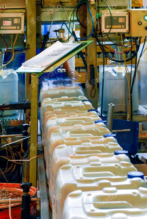 Preview: The Oil Is Dispensed In The Gallon At A Lubricant Factory