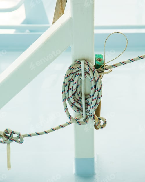 Preview: Ships Rope Tied To Posts On White Bulkhead