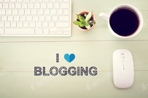 Preview: I Love Blogging Concept With Workstation On A Light Green Wooden Desk