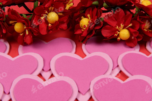 Preview: Pink Hearts Overlaid On Red Background To Remind Valentine'S Day With Flowers On The Top Border