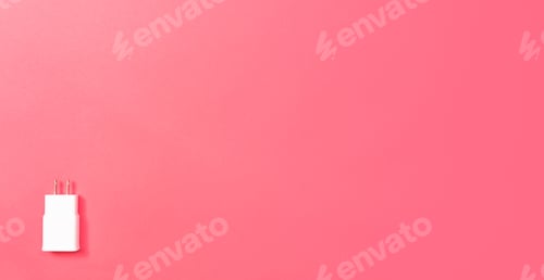Preview: Charger Plug Adapter On A Pink Paper Background