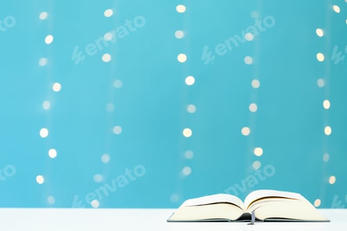 Preview: A Big Book On A Shiny Light Blue Background