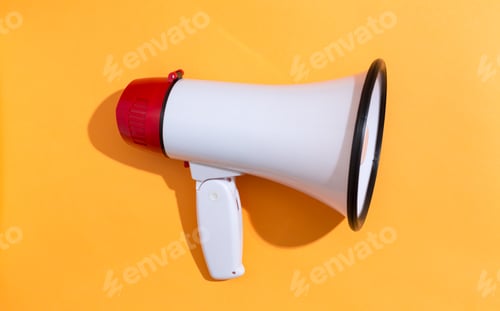 Preview: A Big Megaphone On A Orange Background