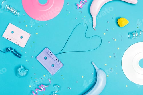 Preview: Music Flat Lay Objects With Vinyl Records And Cassette Tapes On A Blue Background