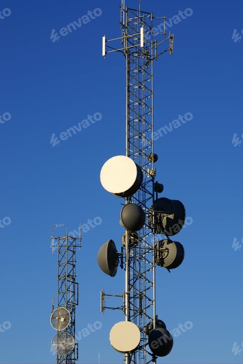 Preview: Antenna Towers Against A Blue Sky